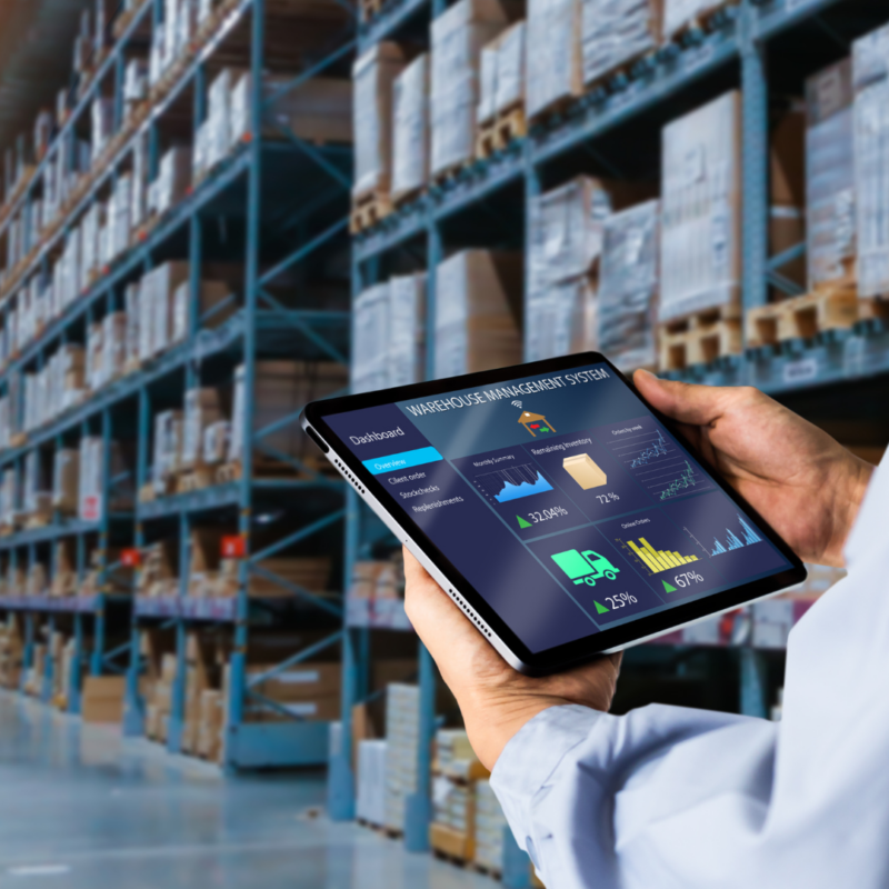 Dashboard with various graphs and charts displayed on a handheld touch screen device in a warehouse